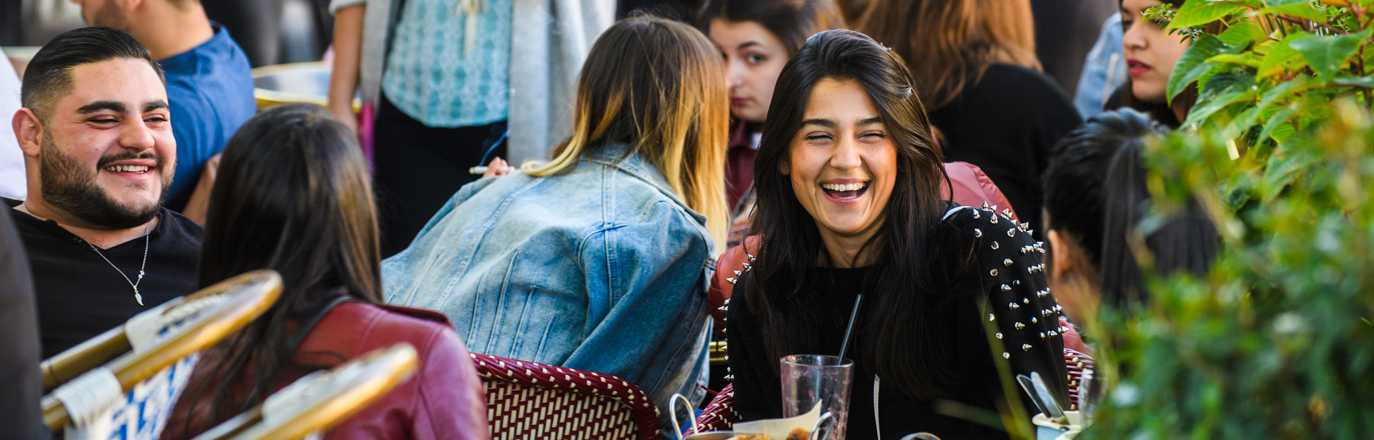 Woman smiling at restaurant